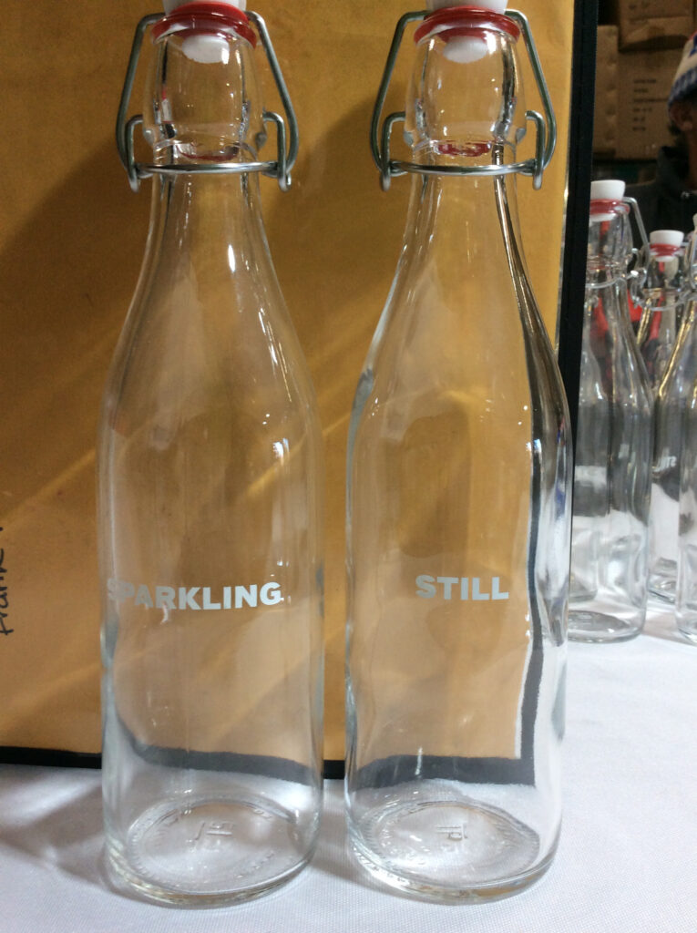 Customized glass bottles with company logo