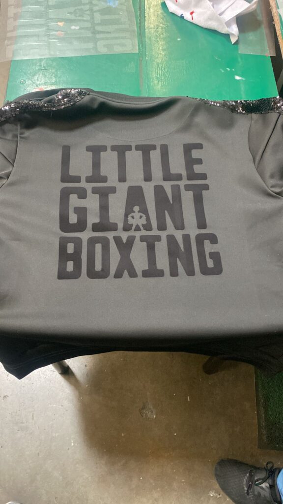 Certainly! If you're looking for a stylish and high-quality way to promote your brand, a custom premium tracksuit boxing set from Promogator is an excellent choice. These tracksuits can be customized with your logo or design printed on the fabric, giving you the flexibility to create a truly unique and personalized product.