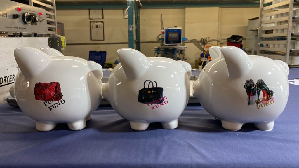 UV printing on customer provided piggy banks with Logo